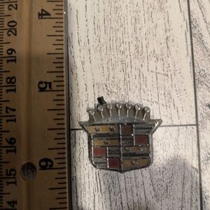 Cadillac Silver and Red Emblem